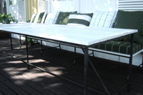 Stort matbord i vitmålad furu, 350 cm. Går bra att ha även utomhus